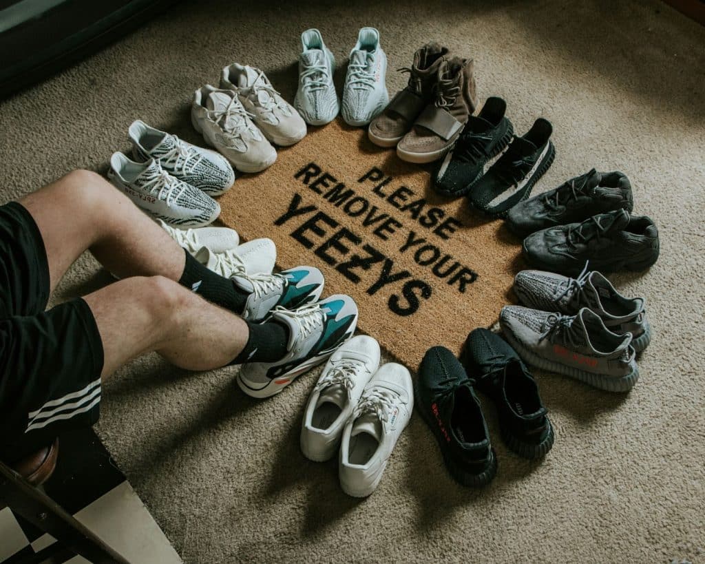A man having a lots of shoes