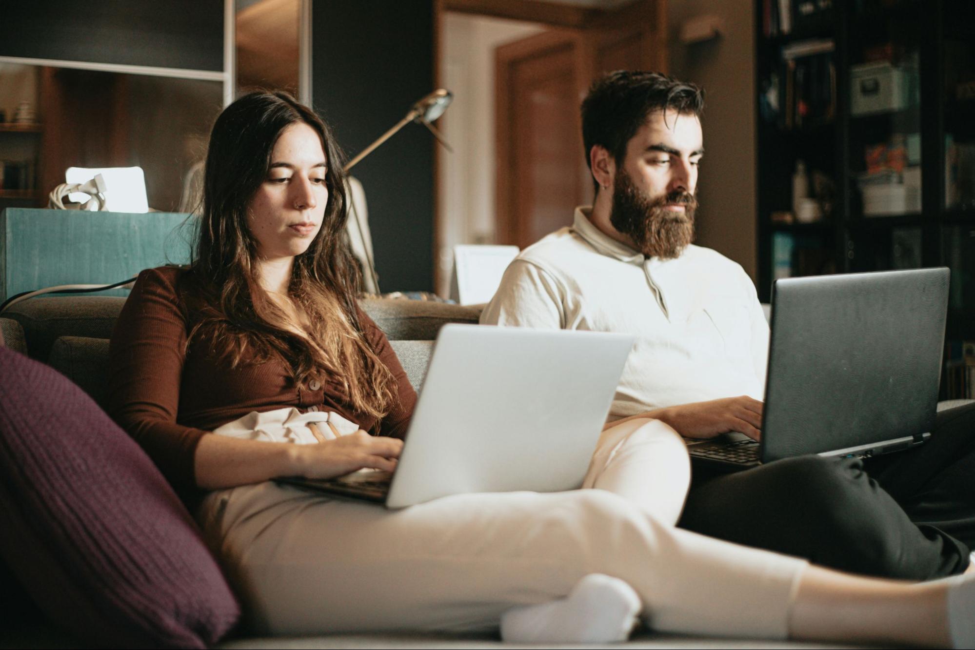 A man and woman busy working