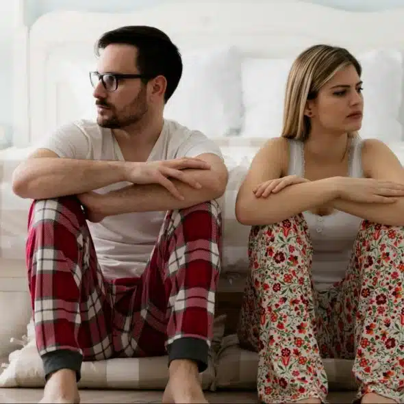 A man and a woman not talking to each other