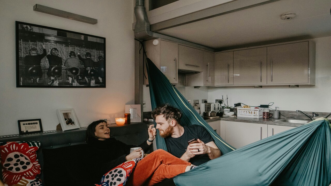 A couple with a hammock at home