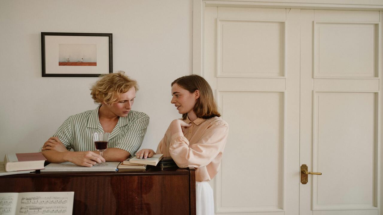A couple having a serious talk at home