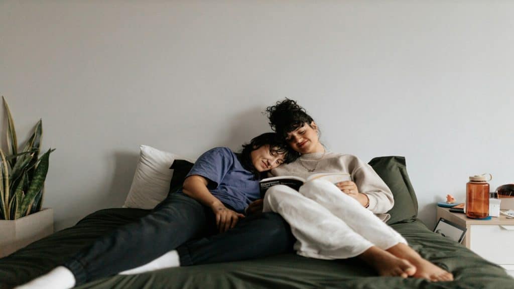 A couple reading together.