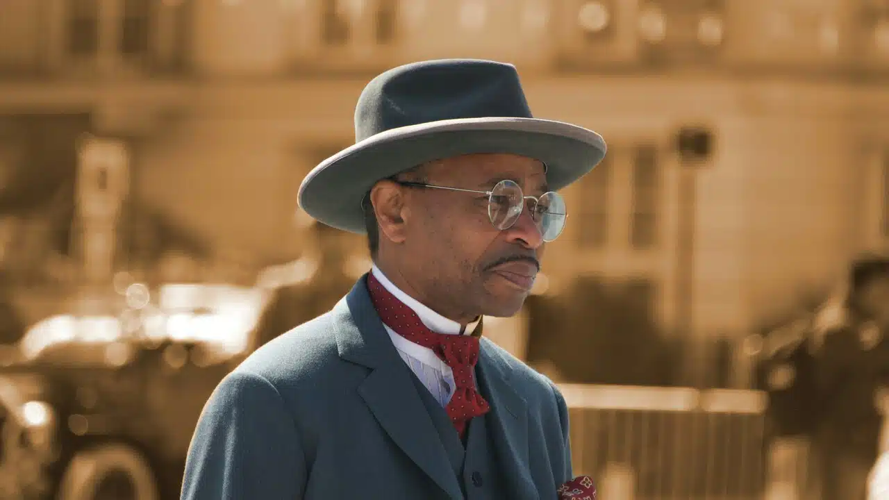 A man wearing a fedora hat.