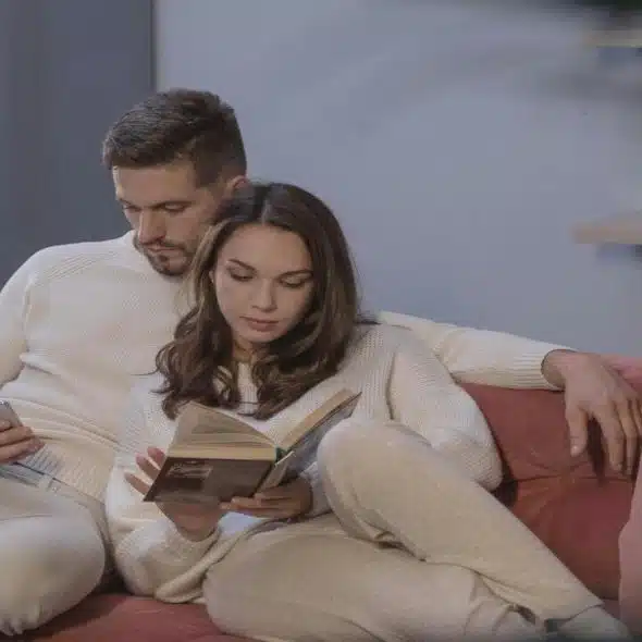 A couple relaxing at home
