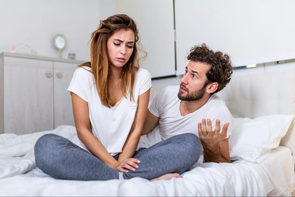 A man and woman talking