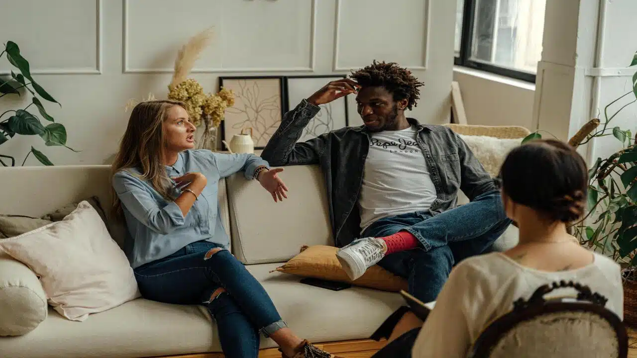A couple talking at a therapy session